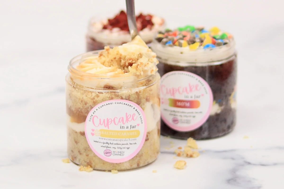 Two Cupcakes in a Jar, one with a spoon in it