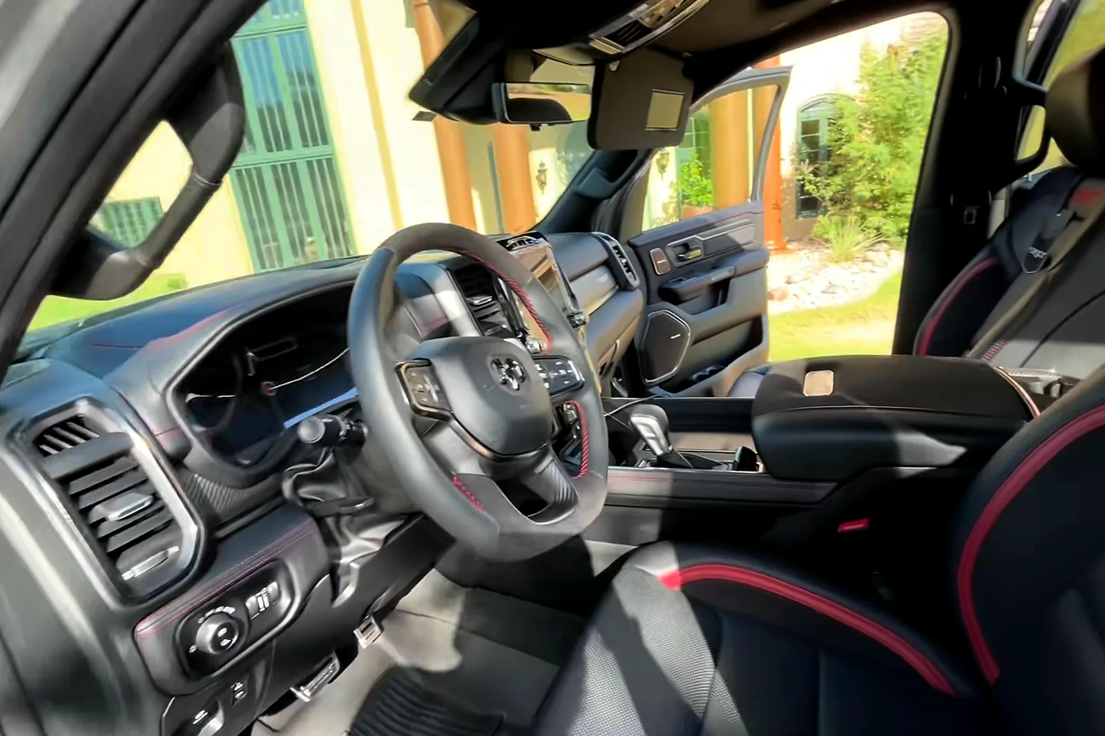 The TRX's driver's seat and dash seen through the open door