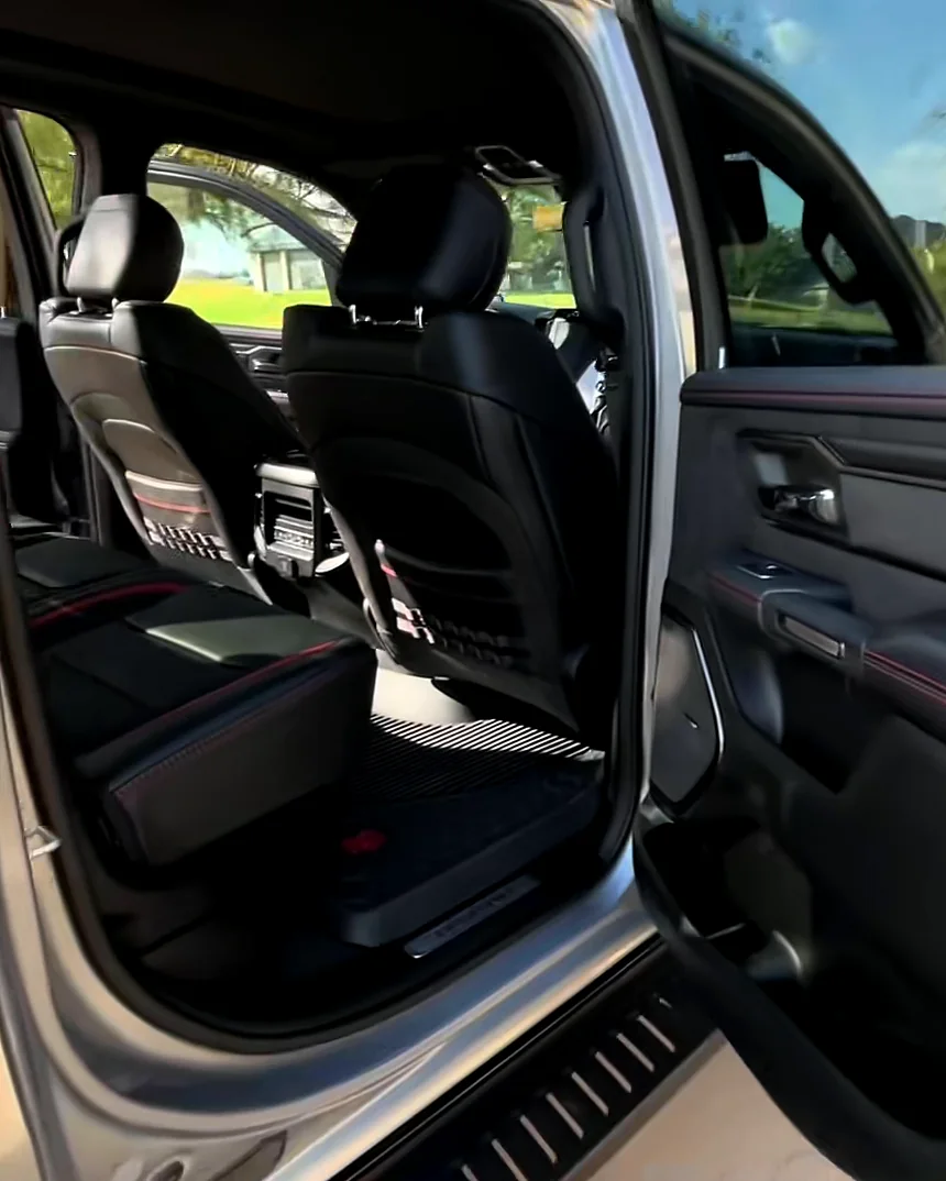 The TRX's black rear seats with red stitching, cleaned