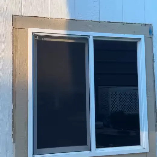 A tinted residential window on a home in Alvarado, Texas